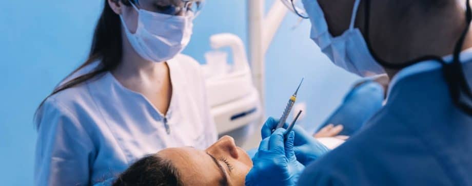 dentists working on patient